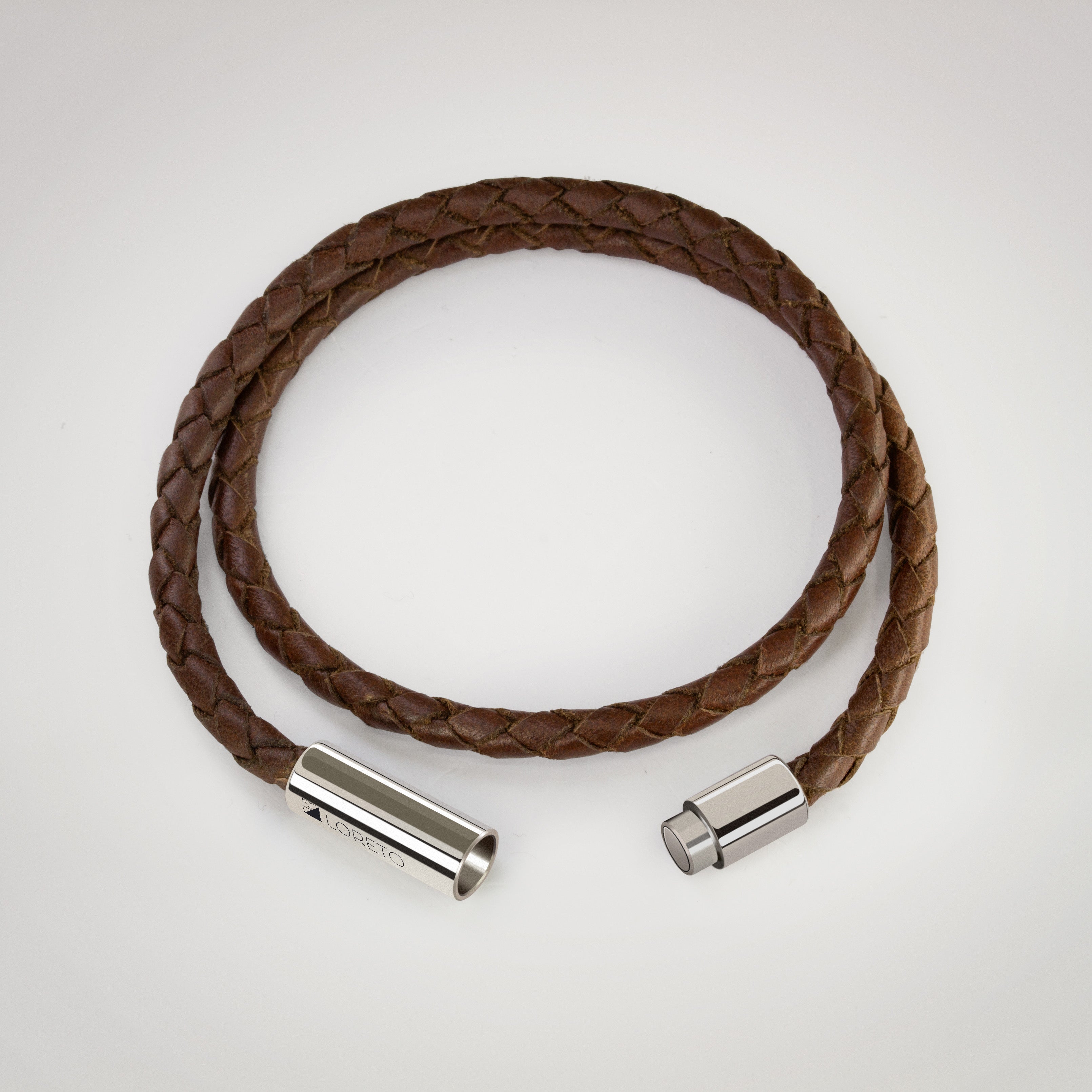 Pulsera trenza doble de cuero marrón 100% argentino y titanio