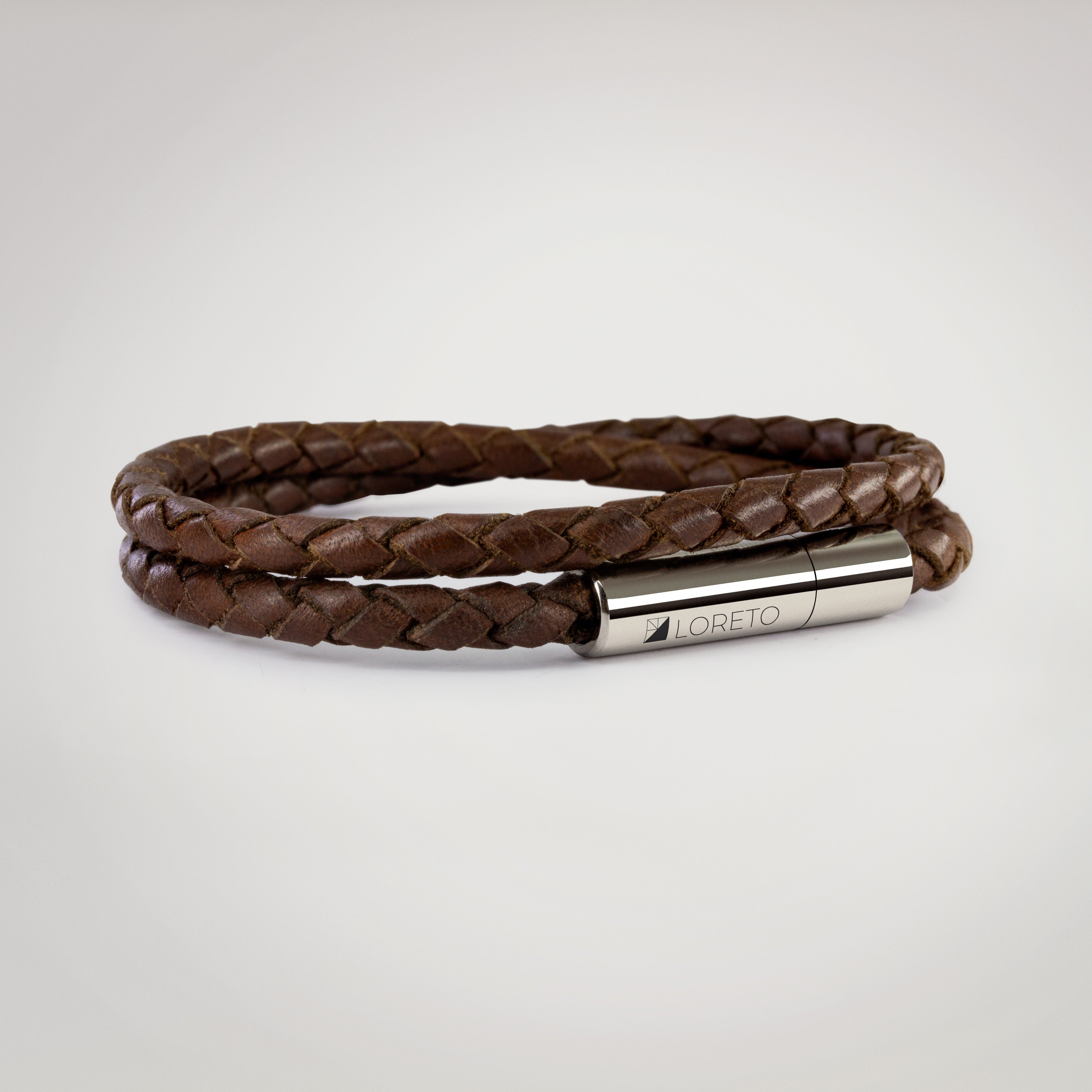 Pulsera trenza doble de cuero marrón 100% argentino y titanio