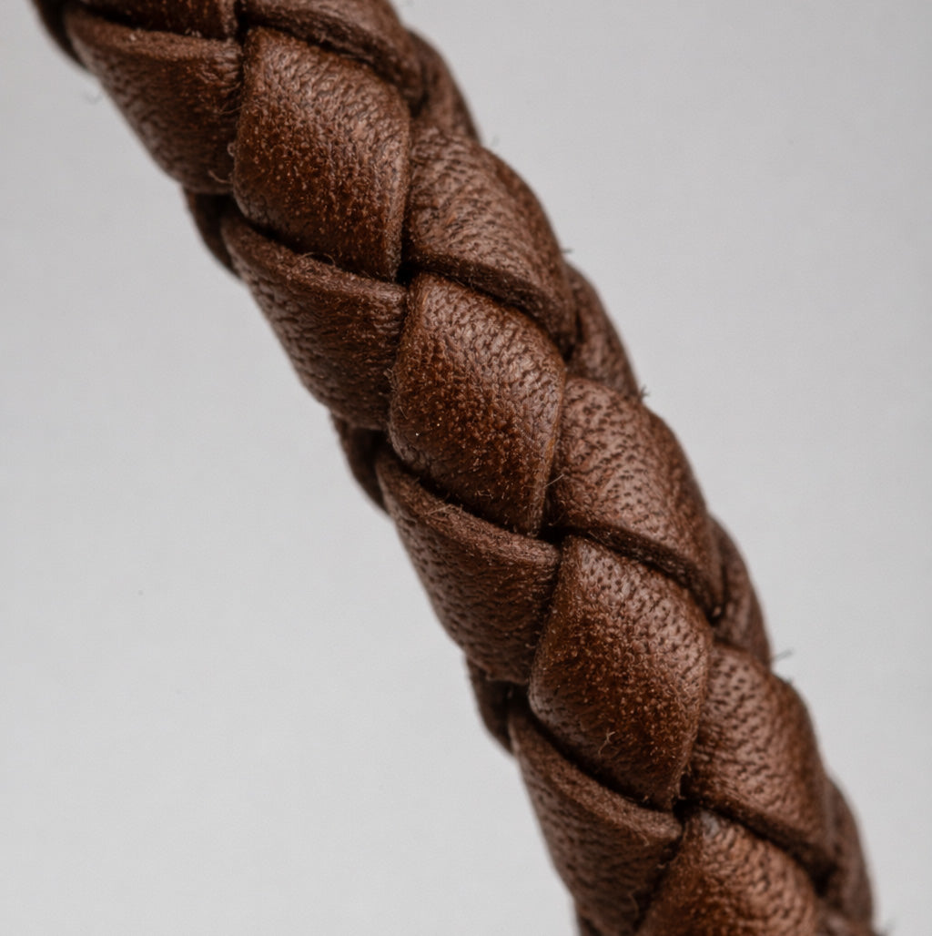 Pulsera trenza doble de cuero marrón 100% argentino y titanio