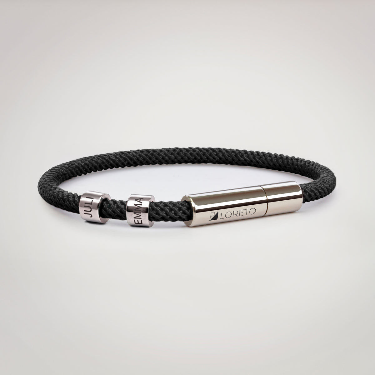 Pulsera negra simple de cuerda y titanio