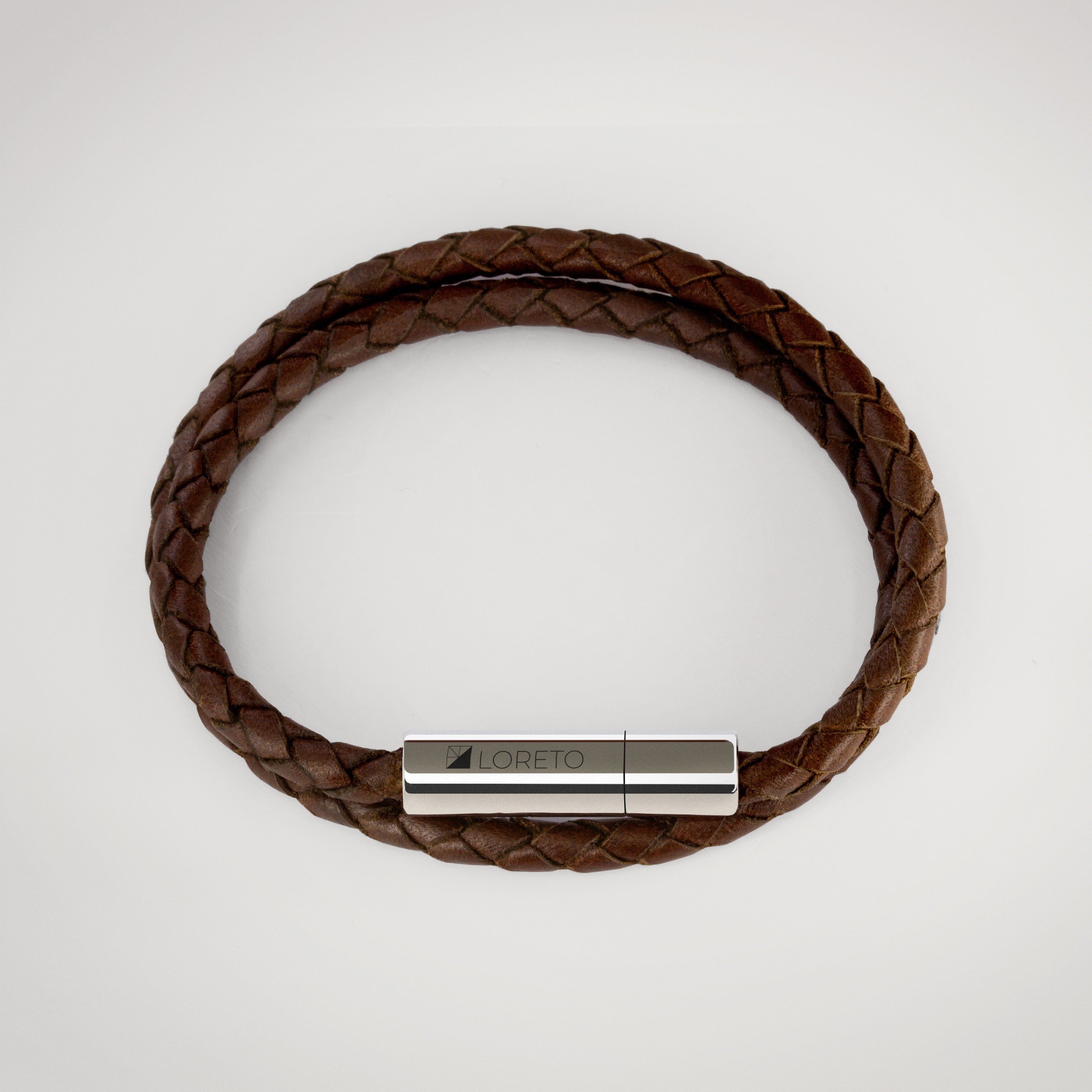 Pulsera trenza doble de cuero marrón 100% argentino y titanio