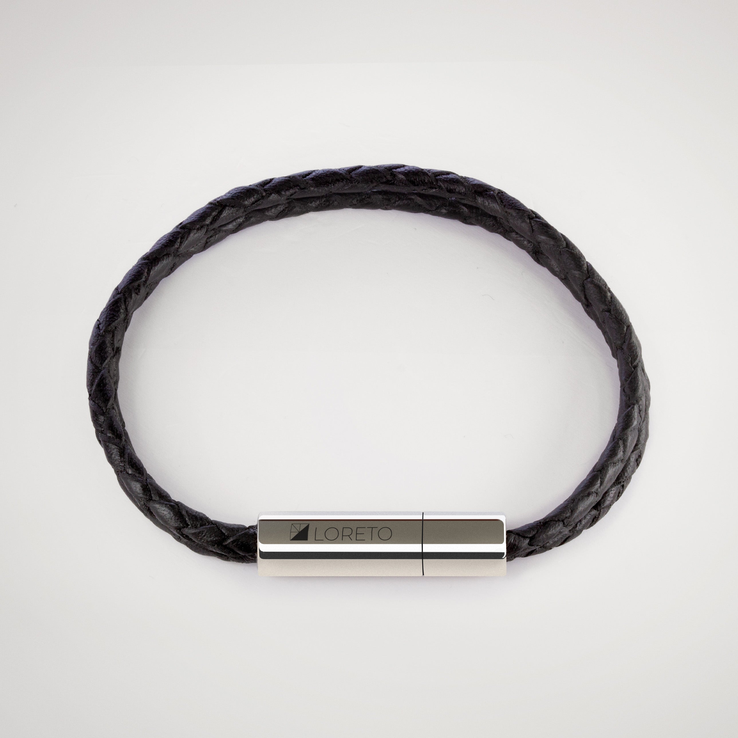 Pulsera trenza duo de cuero negro 100% argentino y titanio