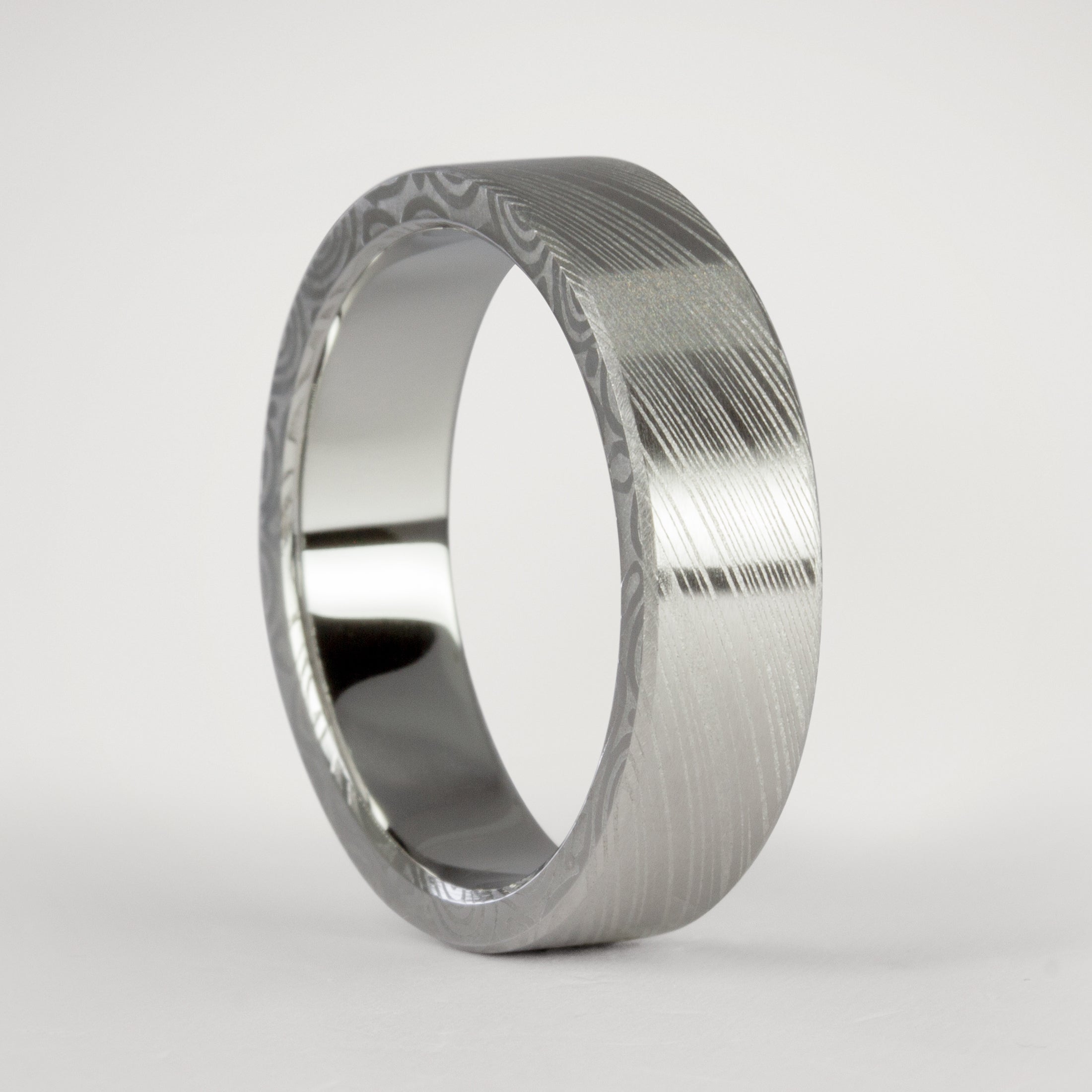 Anillo acero damasco HK pulido cinta